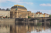 Cityscape of Prague, citiy in the Czech Republik, with national theatre and river Vltava