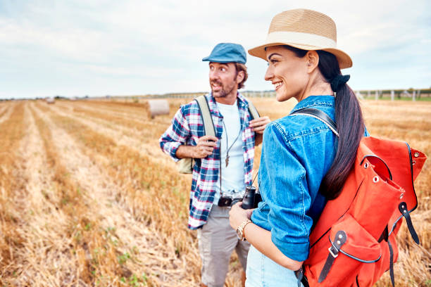 istock cheerful couple hiking together 1162958428