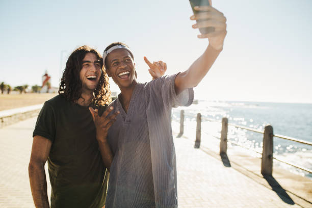 istock Friends make a selfie on the seaside hangout 1162959023