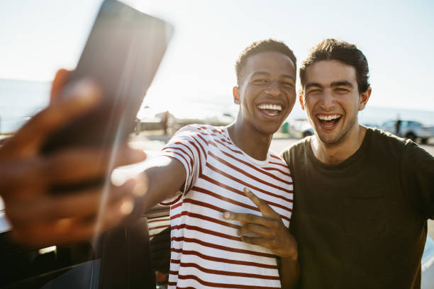 Friends making a self portrait outdoors