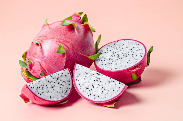 Fresh dragon fruit. Fresh dragon fruit on pink background. pitaya photos stock pictures, royalty-free photos & images