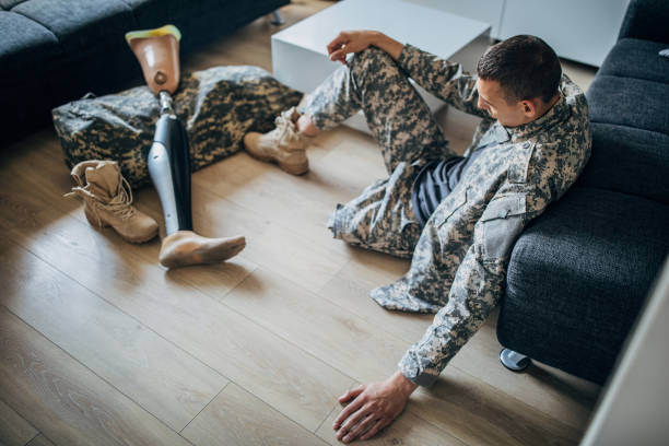 istock US soldier with one leg sitting at home alone 1162959858