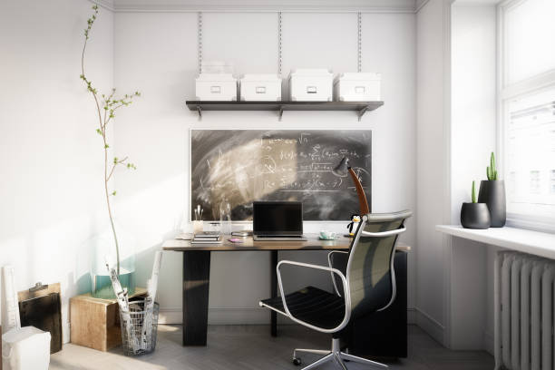 Affordable Home Office Digitally generated cozy and affordable home office interior design.

The scene was rendered with photorealistic shaders and lighting in Autodesk® 3ds Max 2020 with V-Ray Next with some post-production added. desk lamp photos stock pictures, royalty-free photos & images