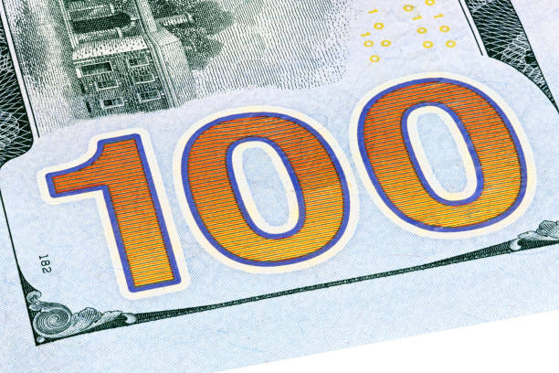 istock Hundred dollars bill fragment on macro, stacked photo. 1162963084