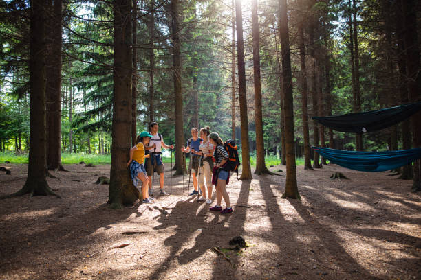 istock Group of mountain climbers preparing to set up a camp 1162963419