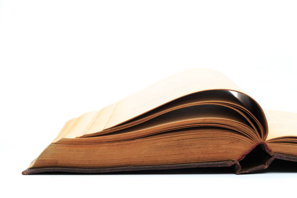istock open vintage book isolated on a white background -Image 1162966028