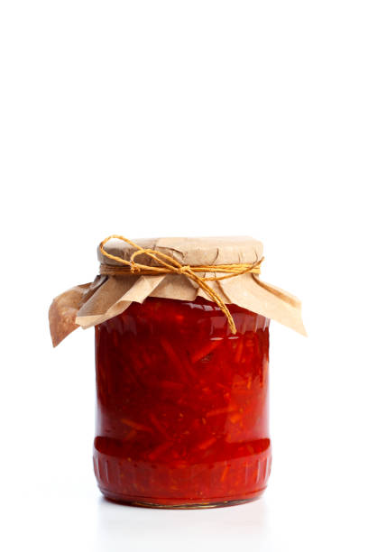 istock glass bottle with preserved food on white background 1162966679