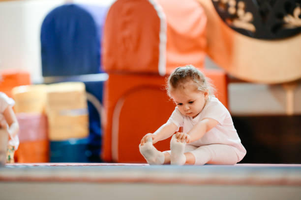 Happy girl during corrective gymnastics