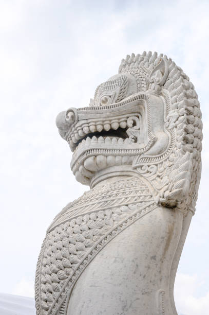 istock traditional marble Singha lion statue in buddhism temple 1162970505