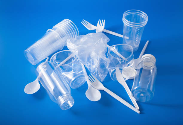 istock single use plastic cups, forks, spoons, bottles. concept of recycling plastic, plastic waste 1162970797