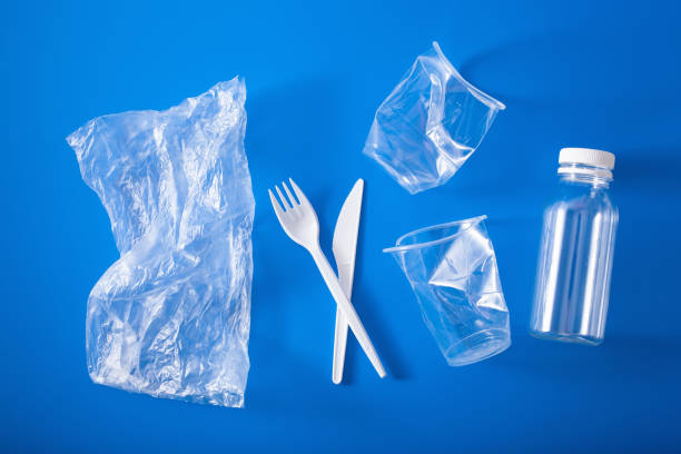 istock single use plastic cups, forks, spoons. concept of recycling plastic, plastic waste 1162971428