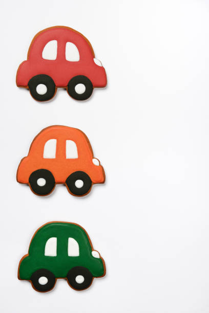 istock The hand-made eatable gingerbread cars on white background 1162971935