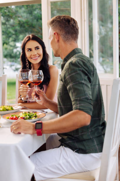istock Happy couple enjoying lunch outside at the weekend 1162974572