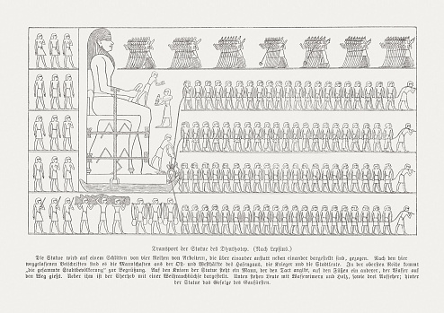 Transportation scene of the colossal statue of Djehutihotep (Egyptian nomarch during the 12th dynasty, c. 1900 BC). The drawing shows which depicts a person standing in front of a wooden sledge and wetting the sand. New research suggests that ancient Egyptians reduced the friction of the sand with water to transport the colossal stones used to build the pyramids. Wood engraving after a bas relief in the tomb of Djehutihotep in Deir el-Bersha, Middle Egypt, published in 1879.