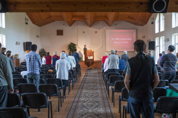 Prayer in the Seventh Day Adventist Church. Vladimir, Russia - May 25, 2019: Prayer in the Seventh-day Adventist world church Translate: For you the Intercessor is Jesus vladimir russia photos stock pictures, royalty-free photos & images