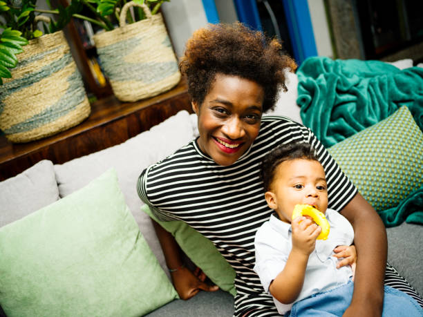 istock Real young mother with little son 1162974999