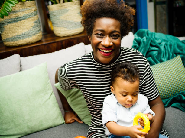 istock Real young mother with little son 1162975031