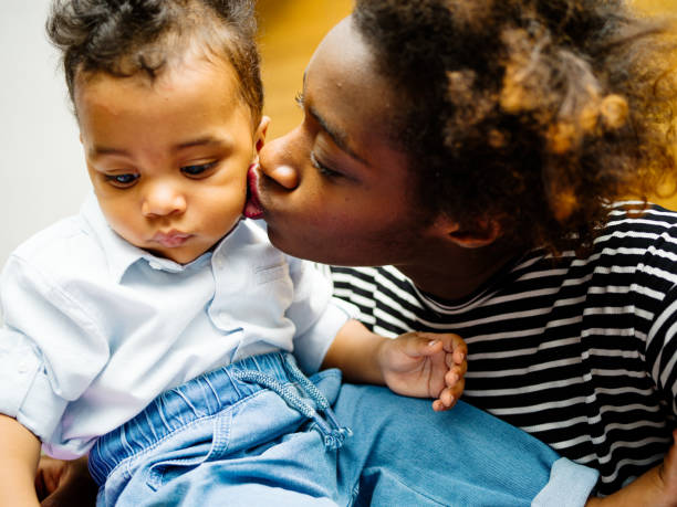 istock Real young mother with little son 1162976368