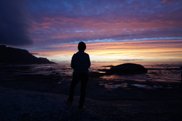 istock Silhouette Woman Watching Cape Town Sunset 1162981882