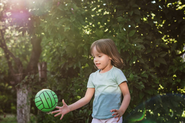 istock Pretty little girl and her ball. 1162990205