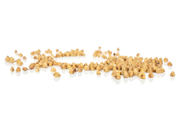 istock Raw buckwheat grain isolated on white 1162995045