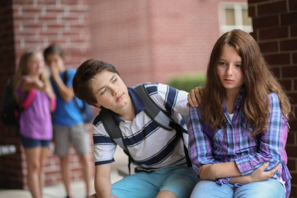 istock Comforting friend after being bullied. 1162995481