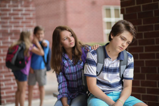 istock Comforting friend after being bullied. 1162995497