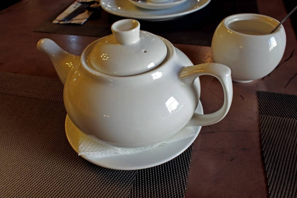 istock teapot with tea on the table prepared for morning tea 1162996432