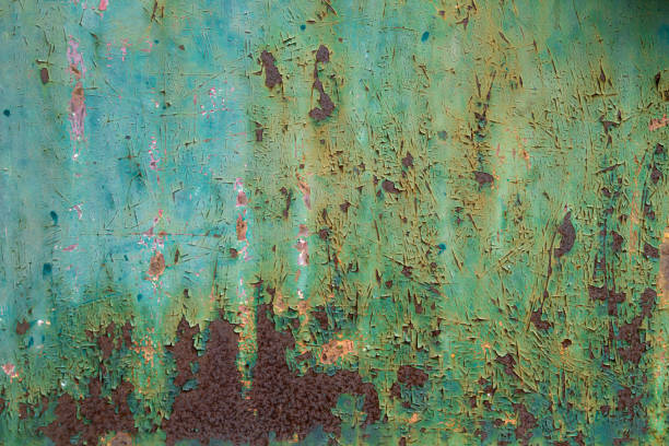 istock Old distressed green rusted wall detail 1162998965