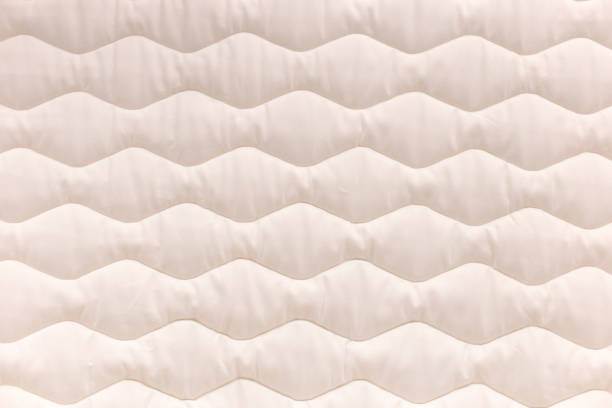 istock Close up mattress texture. Comfortable sleep concept. New modern mattress, for background. 1163005146