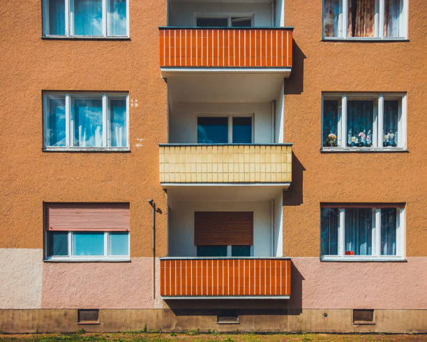 apartment building at east berlin in the summer - construction apartment house in a row imagens e fotografias de stock