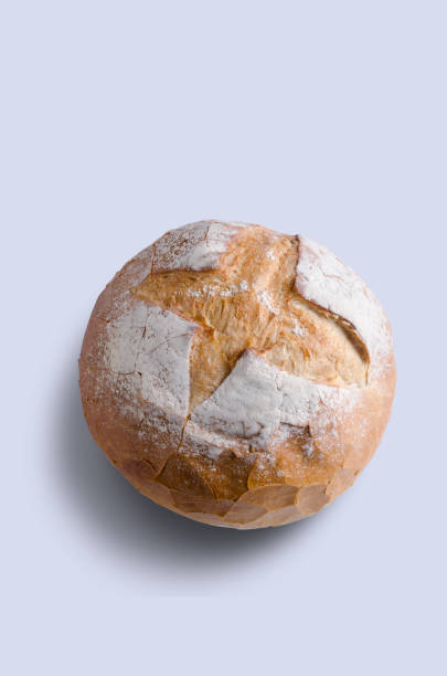 istock Large Coburn Cob bread on plain background with copy space at top and bottom 1163008952