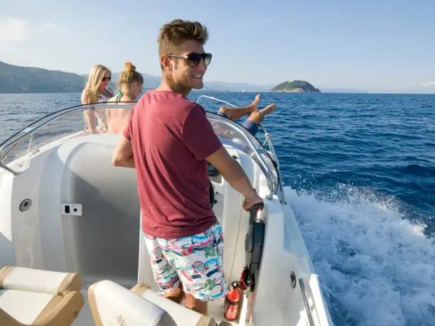 Photo of Friends hangout on speed boat in Mediterranean sea