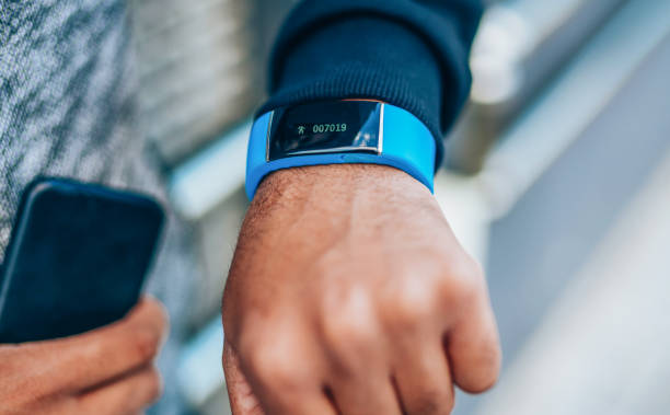 istock Sportsman checking his smart watch 1163010768
