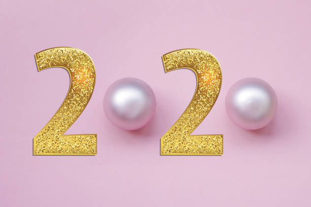 istock new year 2020. festive background, minimalism, space for text. top view, pink background. 1163011203