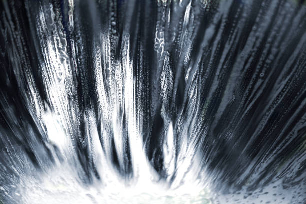 Vehicle going though a touchless carwash.