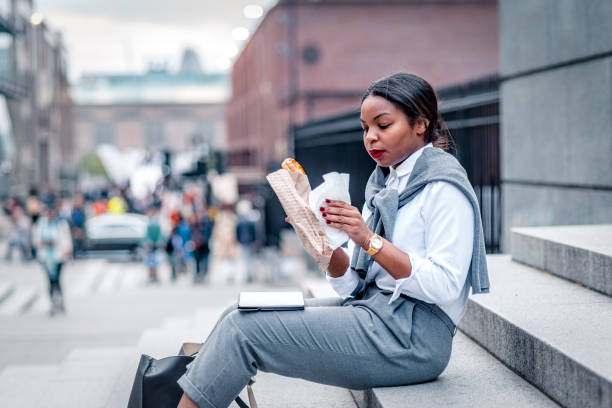 istock African-American businesswoman taking a break 1163013048