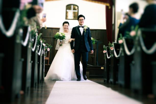 istock Happy asian bride and groom 1163014179