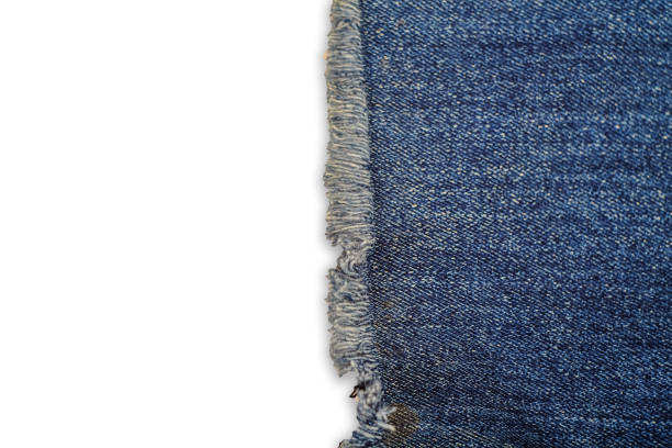 istock tear of denim texture with a hole and threads showing 1163014440