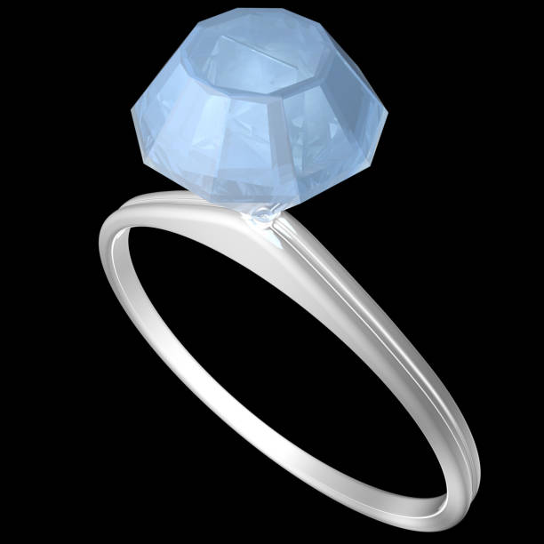 istock Engagement ring in white gold with a big blue diamond on black background 1163017345