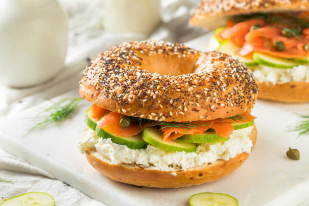 Homemade Salmond Lox Sandwich Homemade Salmond Lox Sandwich with Cream Cheese and Capers chopped dill stock pictures, royalty-free photos & images