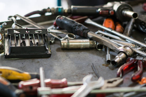 istock Car repair tools and wrenches close-up 1163021200