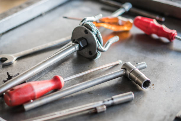 istock Car repair tools and wrenches close-up 1163021219