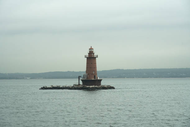 istock Small Light house off of Staten Island 1163023735