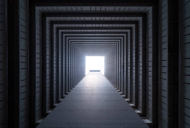 istock Bottom view of stack building floors with copy space for construction and architecture design background. Looking up at abstract modern tunnel corridor. 1163025380