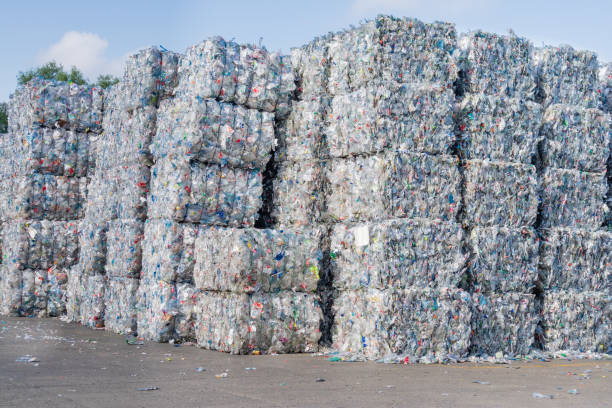 Plastics recycling centers and raw material Plastics recycling centers and its raw material as collection, preparation and transformation polytetrafluoroethylene photos stock pictures, royalty-free photos & images