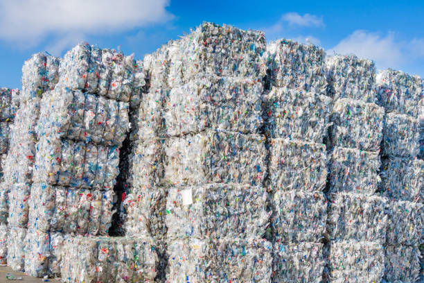 Plastics recycling centers and raw material Plastics recycling centers and its raw material as collection, preparation and transformation polytetrafluoroethylene photos stock pictures, royalty-free photos & images