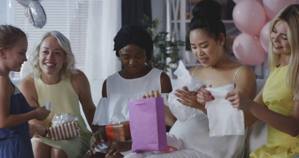 istock Friends celebrating young mother 1163030465