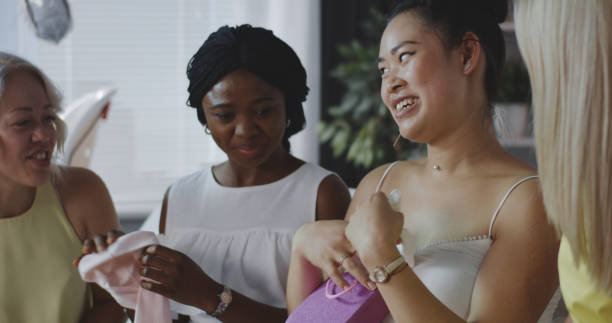 istock Friends celebrating young mother 1163030504