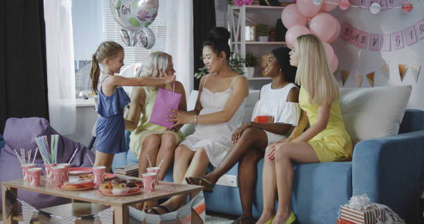istock Friends celebrating young mother 1163030570